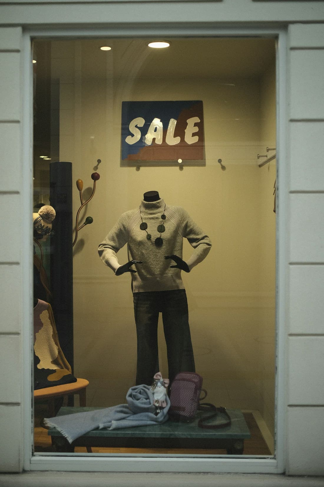 A sale sign in a shop window